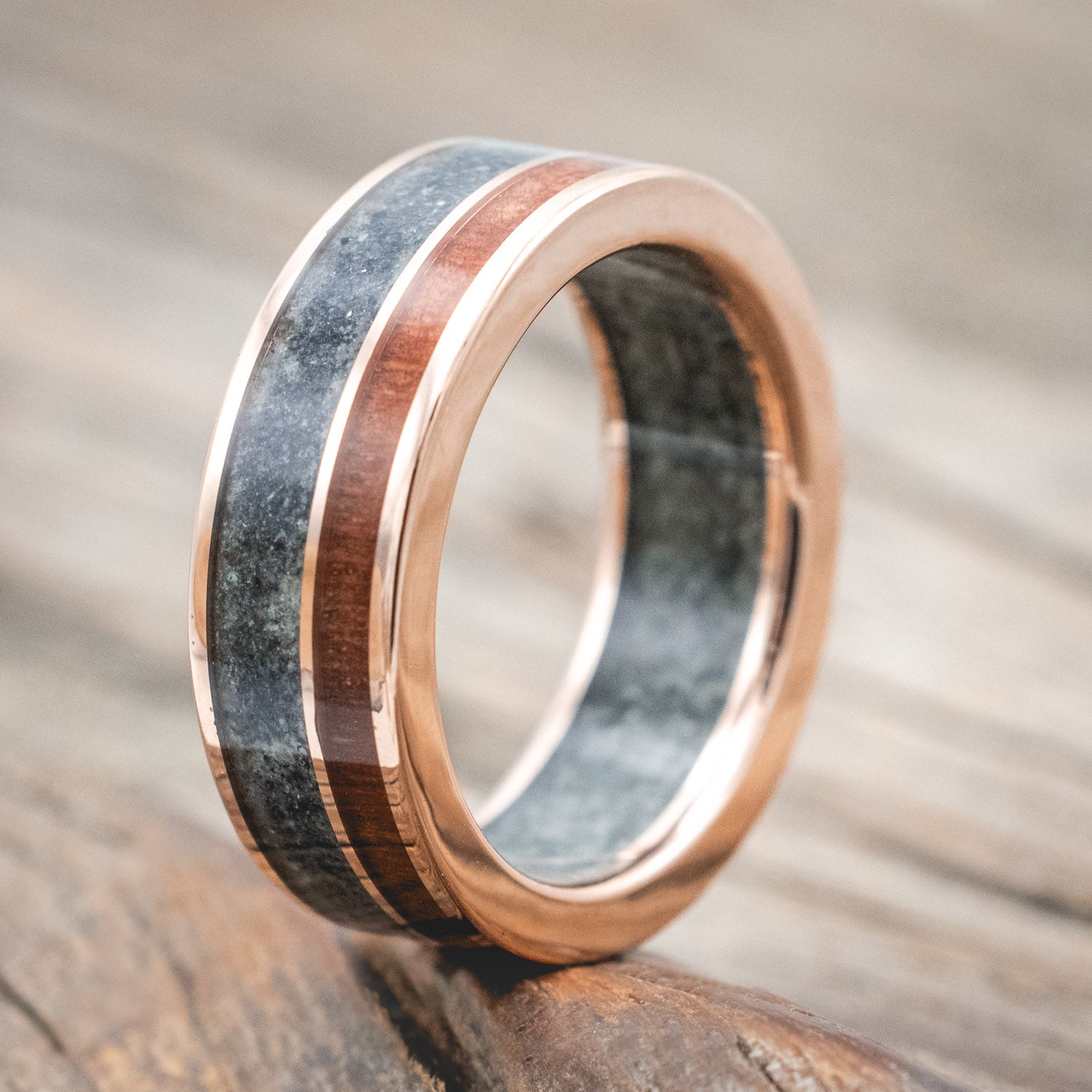 "Raptor"- men's wedding ring featuring moss agate and redwood inlays on a moss agate lined band