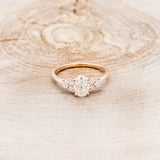 "RHEA" - OVAL MOISSANITE ENGAGEMENT RING WITH DIAMOND ACCENTS