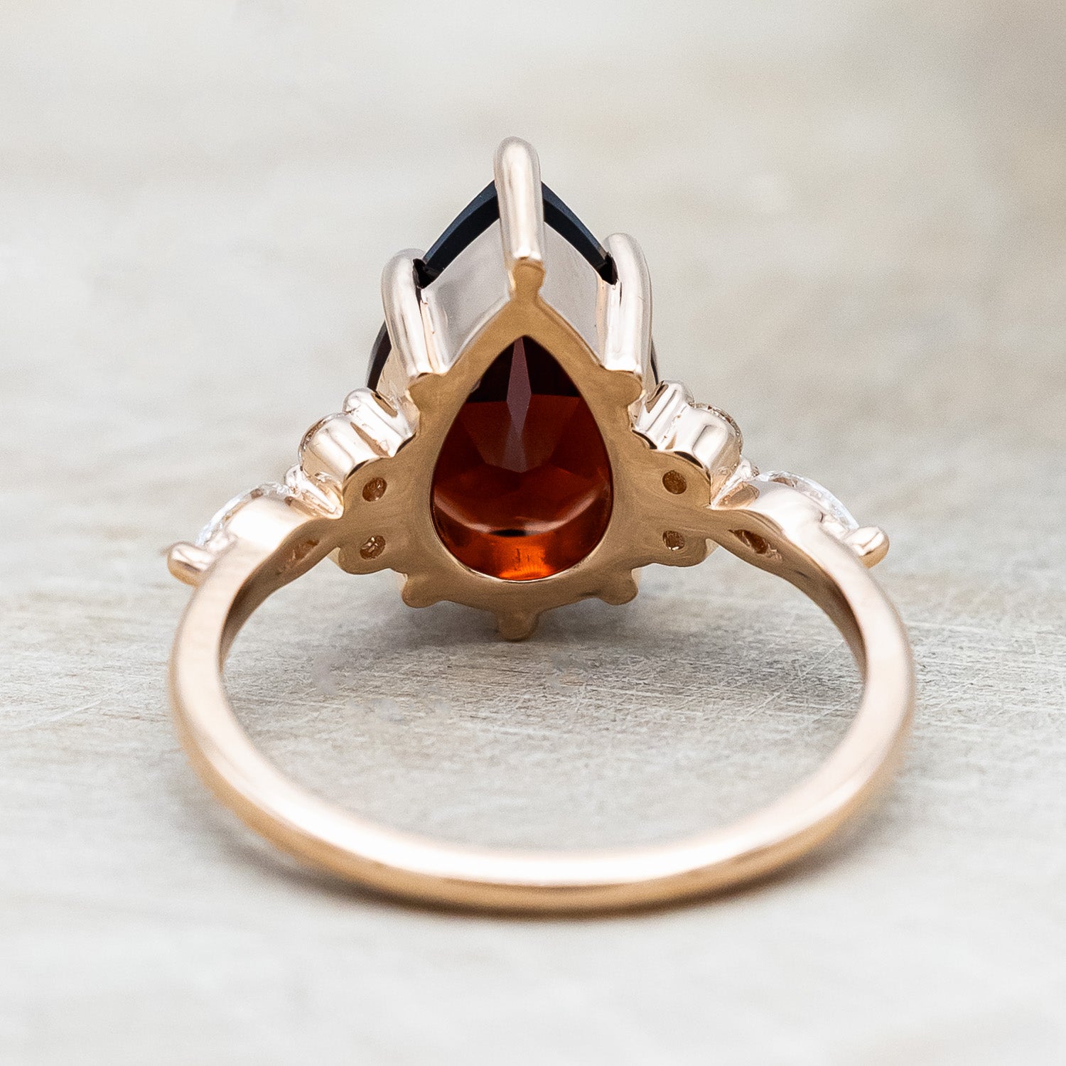 Back view of "Sage" - garnet women's engagement ring with diamond accents