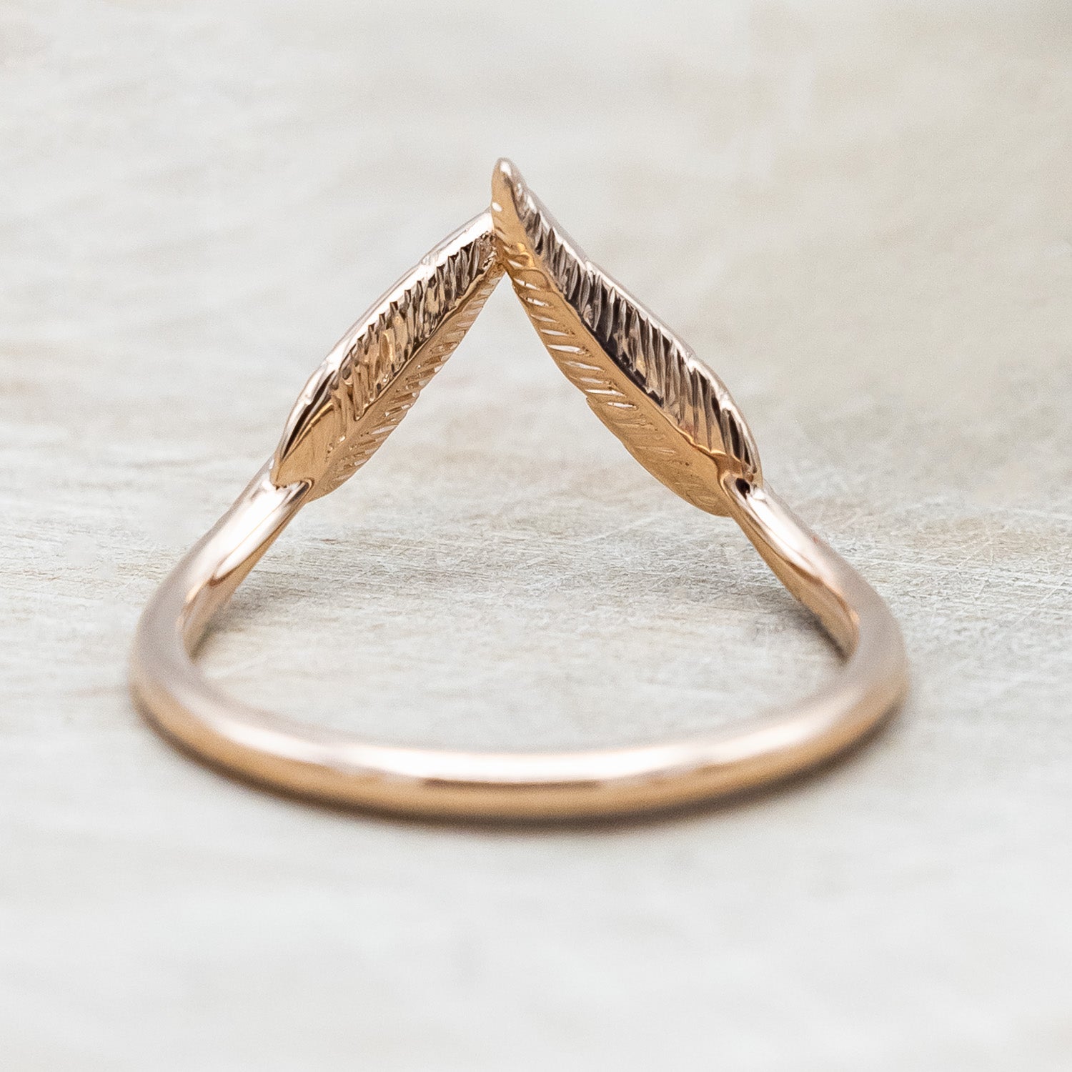 Back view of "Fala" - 14K gold feather-style tracer