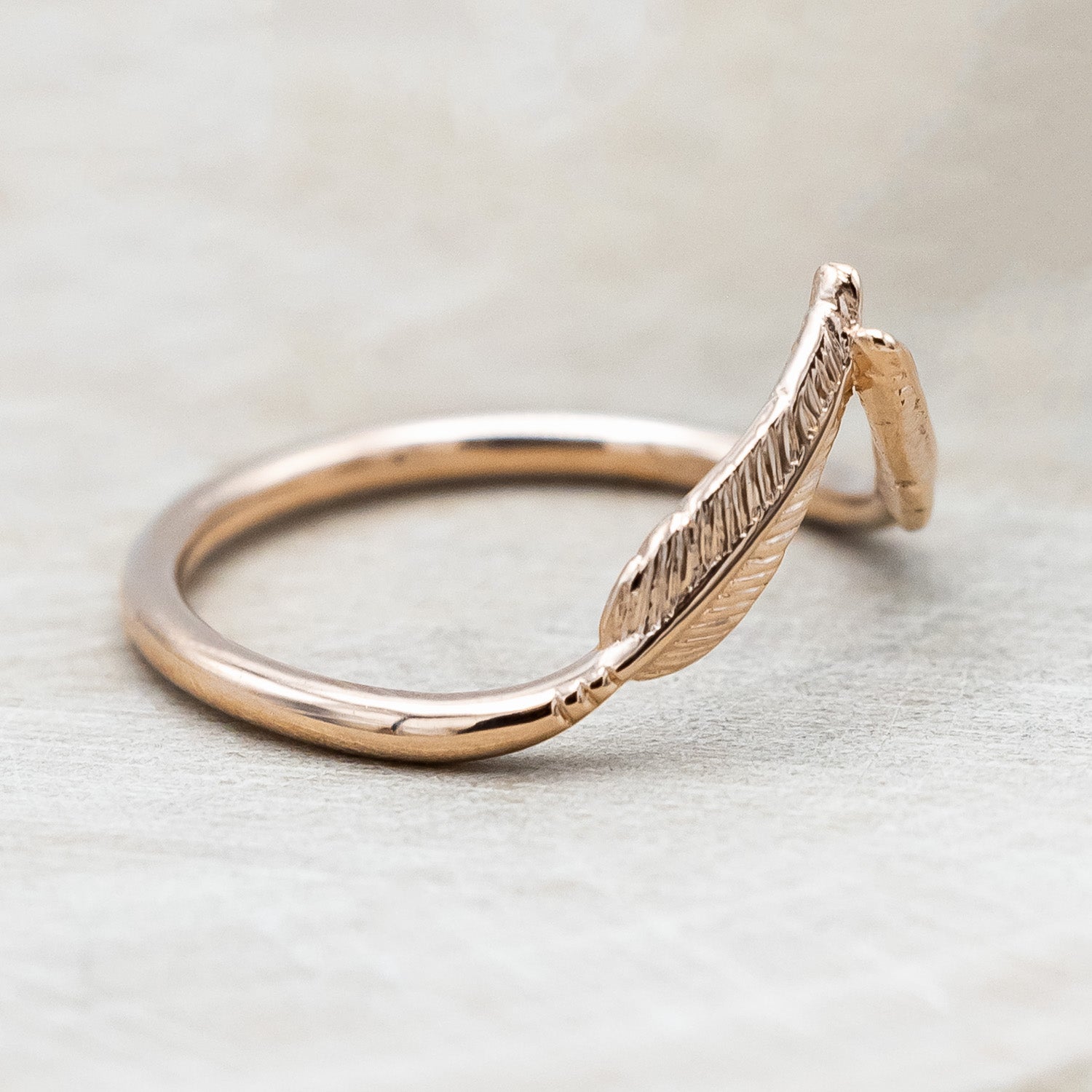 Side view of "Fala" - 14K gold feather-style tracer