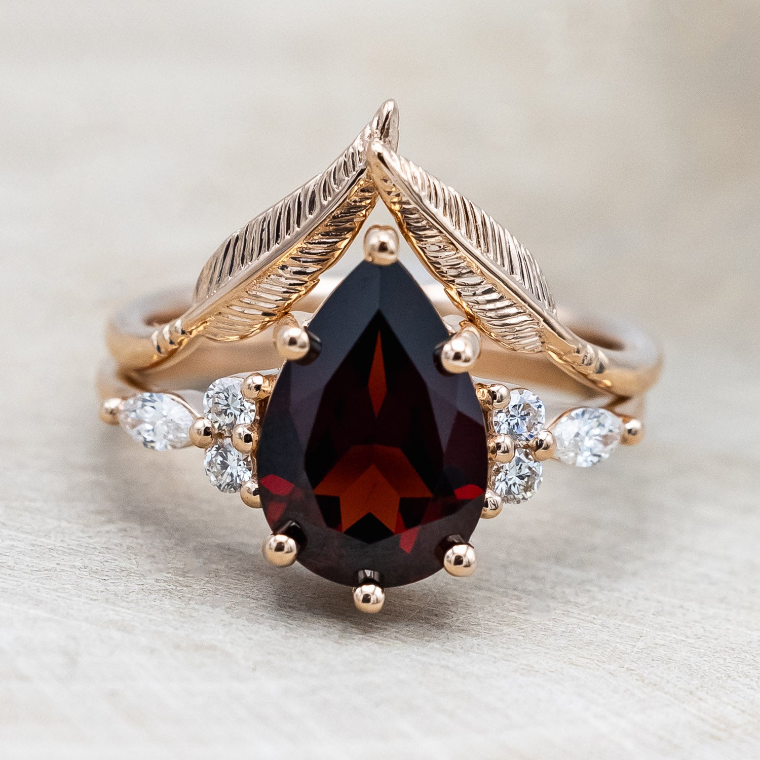 "Sage" - garnet women's engagement ring with diamond accents & "Fala" feather-style tracer