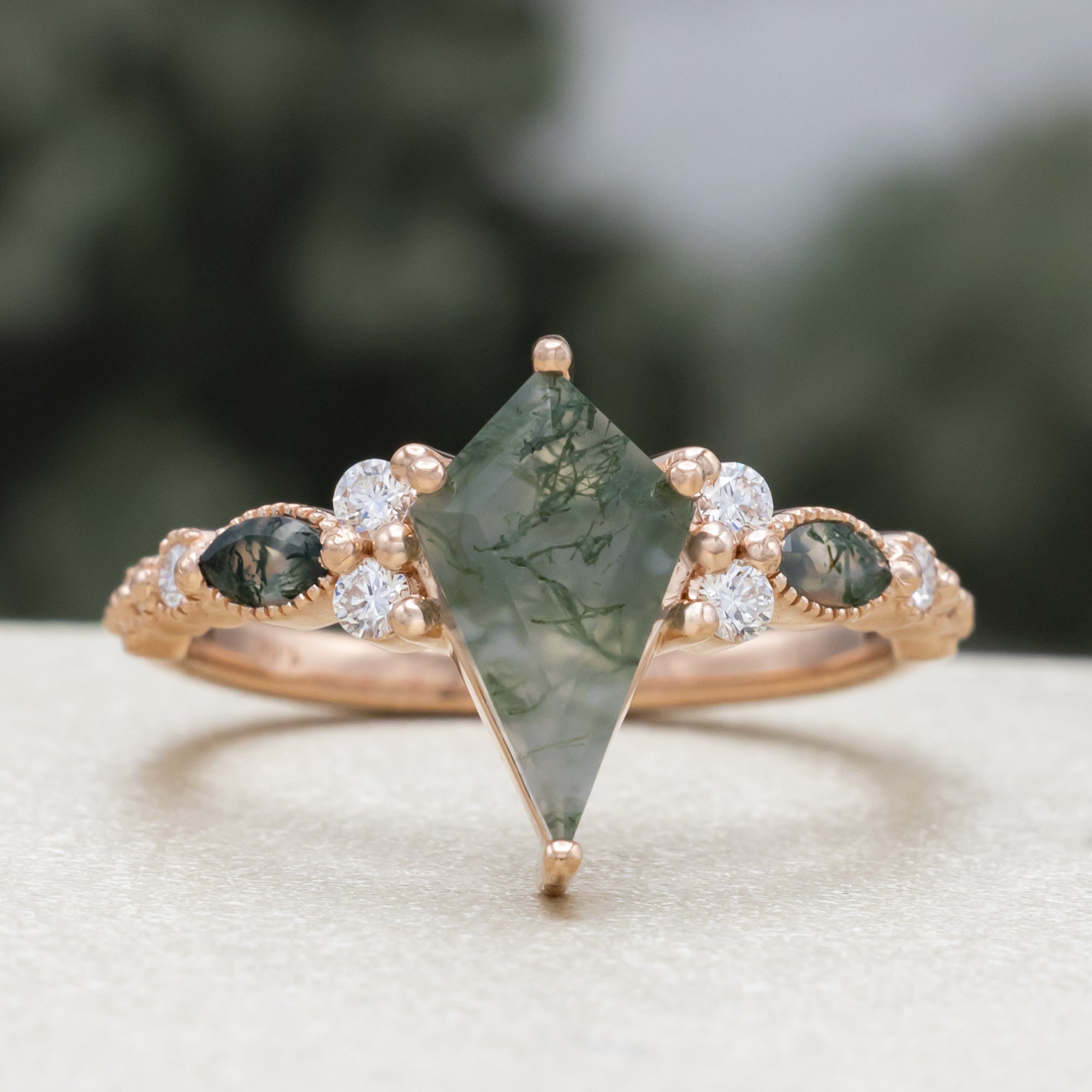 "Shimmering Sage" - Bridal Suite - Kite Cut Moss Agate Engagement Ring With Marquise Moss Agate Accents & A Diamond Tracer-Staghead Designs