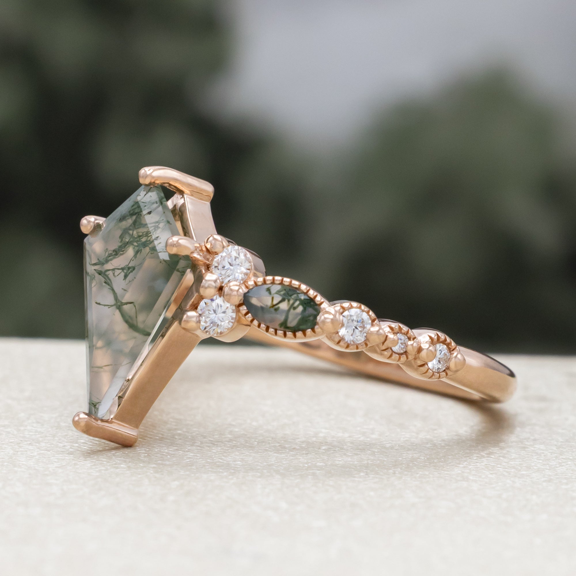 "Shimmering Sage" - Bridal Suite - Kite Cut Moss Agate Engagement Ring With Marquise Moss Agate Accents & A Diamond Tracer-Staghead Designs