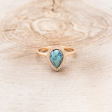 "TERRA" - PEAR-SHAPED TURQUOISE ENGAGEMENT RING WITH DIAMOND HALO