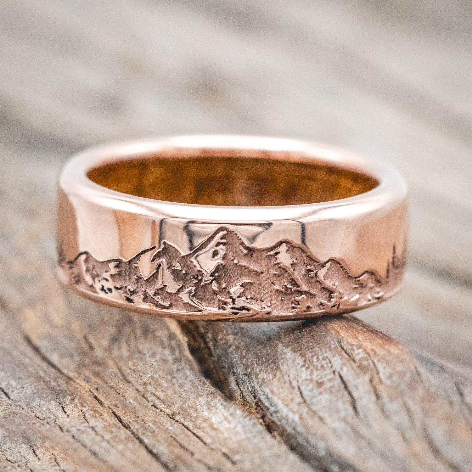 Whiskey barrel oak lined band featuring a continual mountain & forest engraving