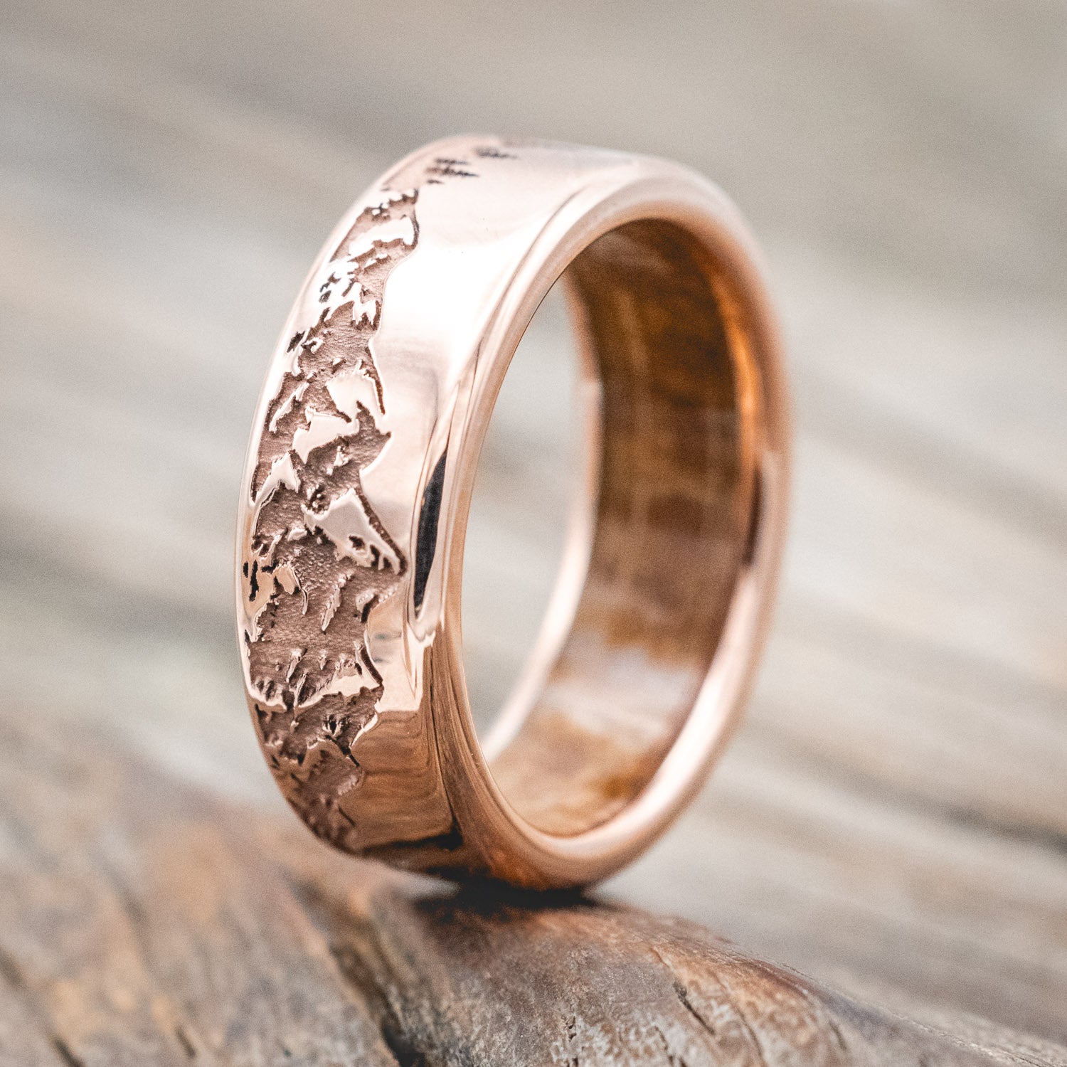 Whiskey barrel oak lined band featuring a continual mountain & forest engraving