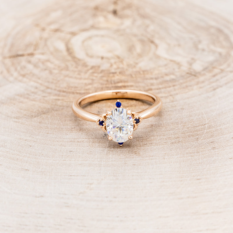 "ZELLA" - OVAL MOISSANITE ENGAGEMENT RING WITH BLUE SAPPHIRE ACCENTS-4