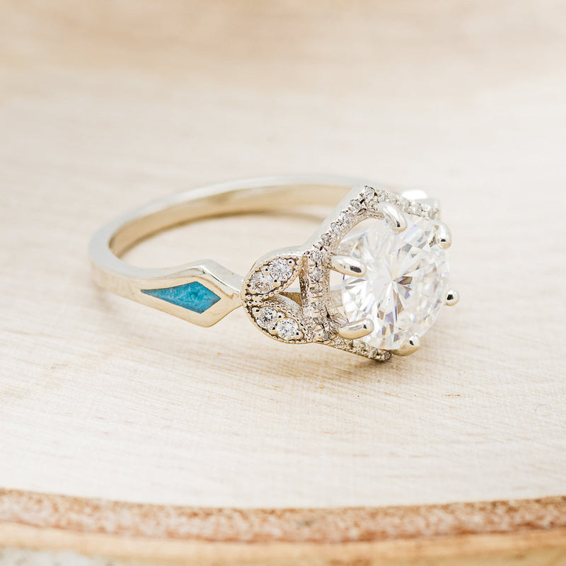 "LUCY IN THE SKY" - ROUND CUT MOISSANITE ENGAGEMENT RING WITH DIAMOND HALO, TURQUOISE INLAYS & DIAMOND TRACER