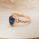 "SCARLET" - PEAR-SHAPED LAB-GROWN ALEXANDRITE ENGAGEMENT RING WITH DIAMOND HALO - READY TO SHIP