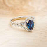 "SCARLET" - PEAR-SHAPED LAB-GROWN ALEXANDRITE ENGAGEMENT RING WITH DIAMOND HALO - READY TO SHIP