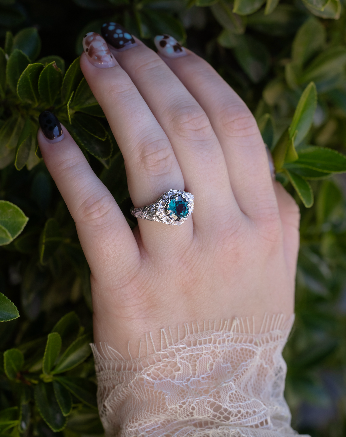 "Gardenia" - Sculptural Solitaire Lab-Grown Alexandrite Engagement Ring With Floral Filigree-Staghead Designs