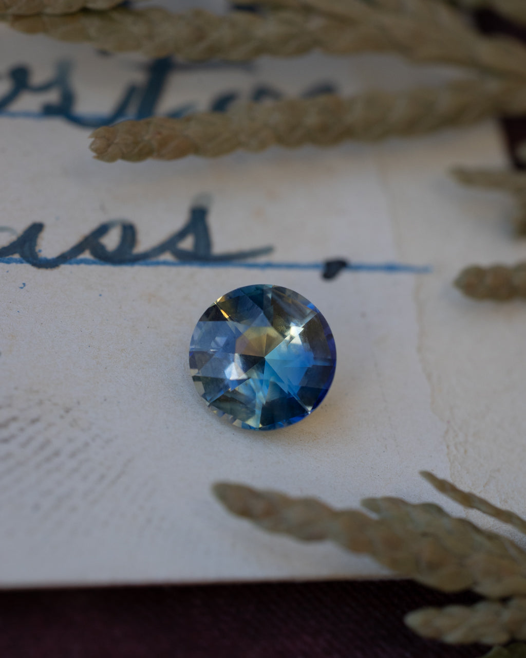 1.10ct 6.18x6.18x3.82mm Round Cut Parti-Color Sapphire