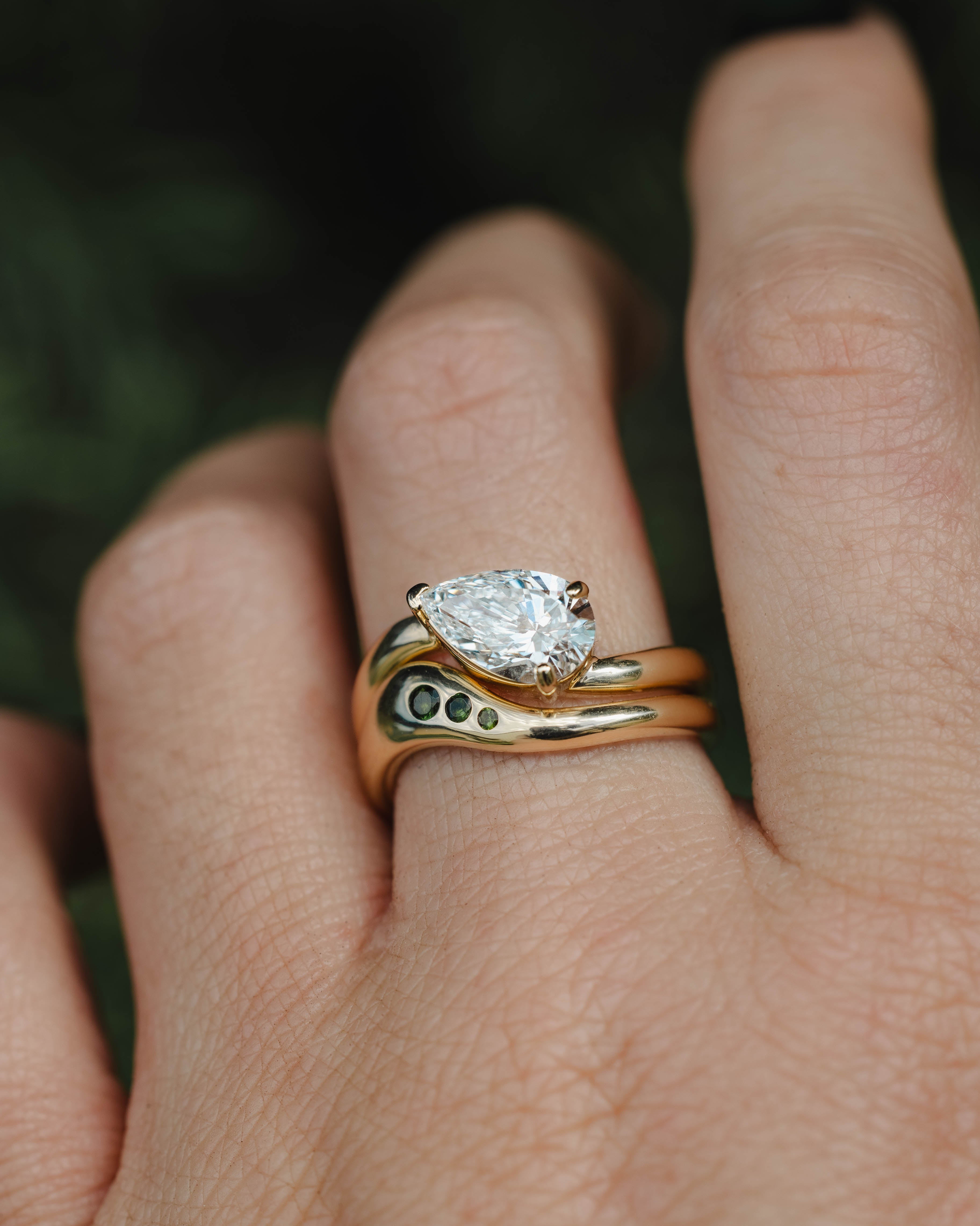 "SYBIL" - ASYMMETRICAL PEAR CUT MOISSANITE ENGAGEMENT RING WITH A GREEN TOURMALINE ACCENTED TRACER-Staghead Designs