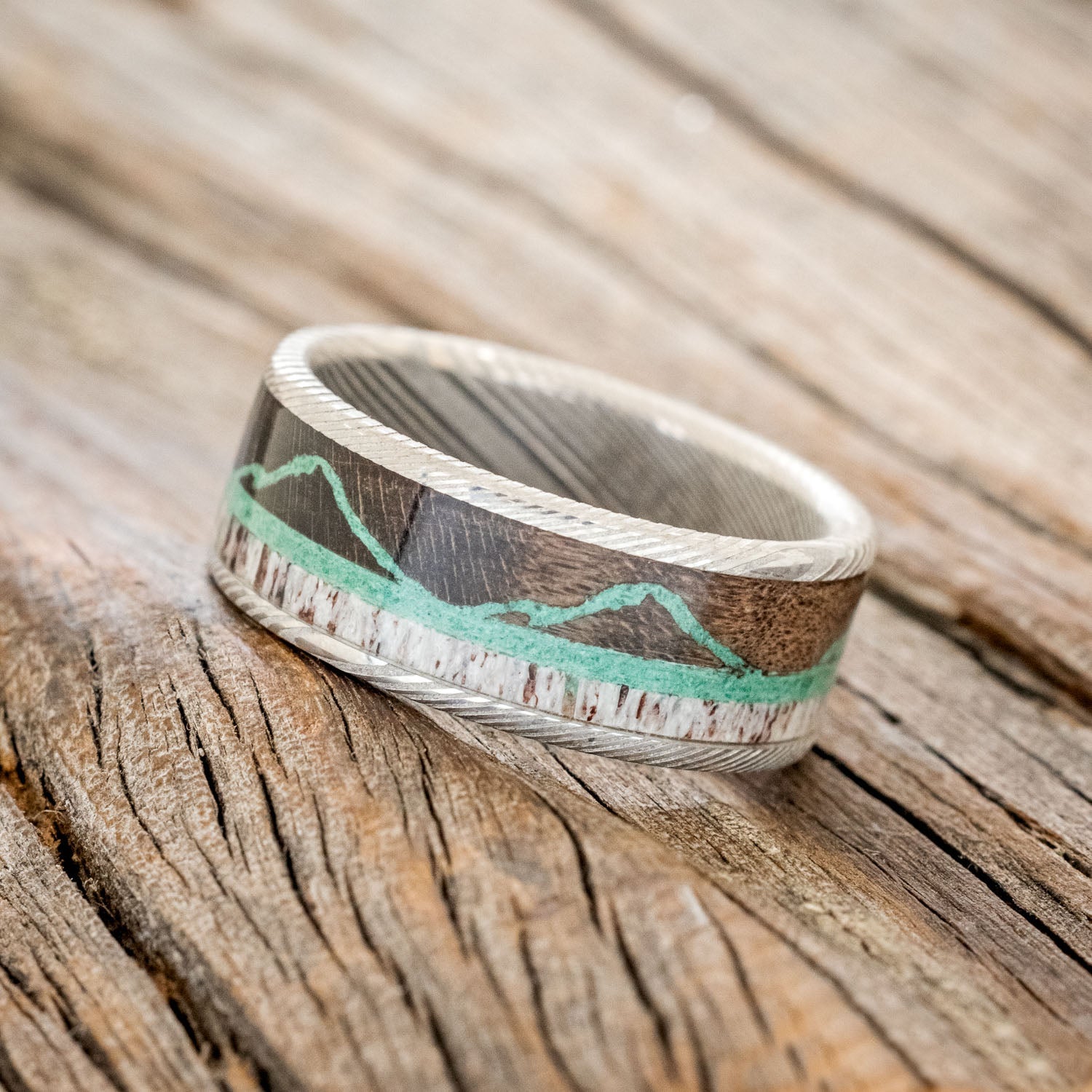 "THE EXPEDITION" - MOUNTAIN ENGRAVED WEDDING RING WITH DARK MAPLE, MALACHITE & ANTLER-1