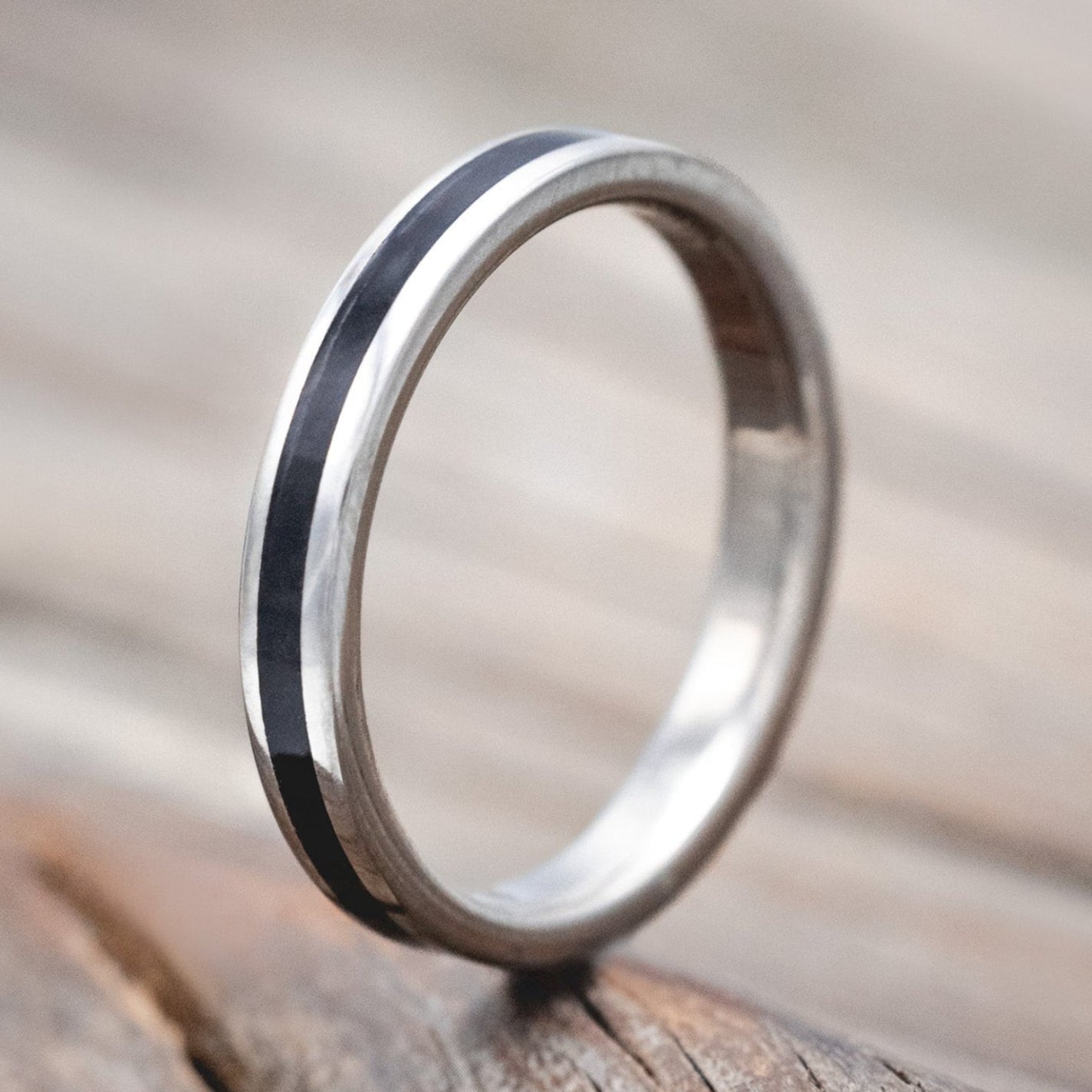 "Eterna" - women's stacking band featuring a jet stone inlay in titanium