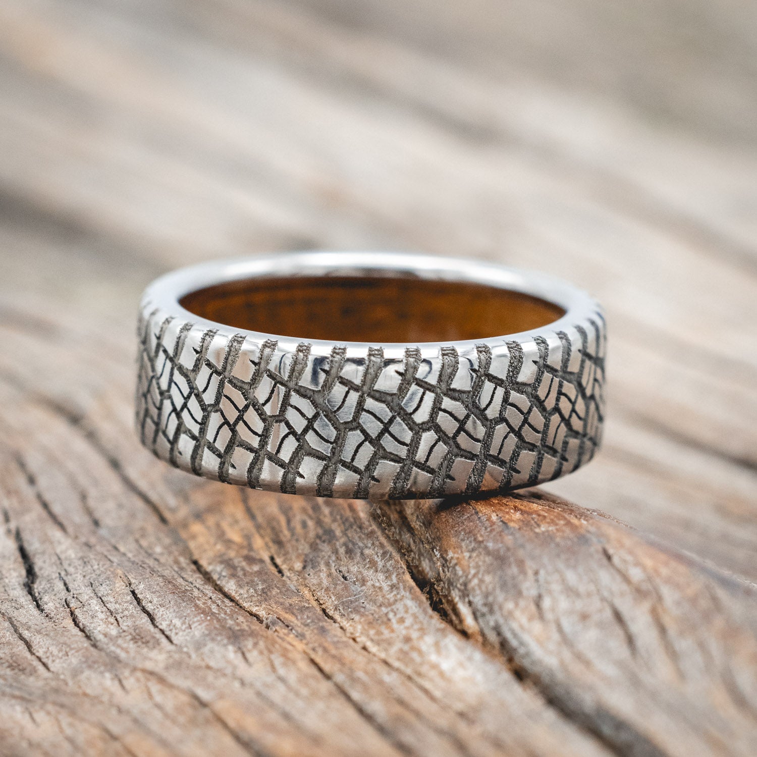 "PARCEL" - CUSTOM EMBOSSED TIRE TREAD WEDDING RING WITH A WHISKEY BARREL LINING-Staghead Designs