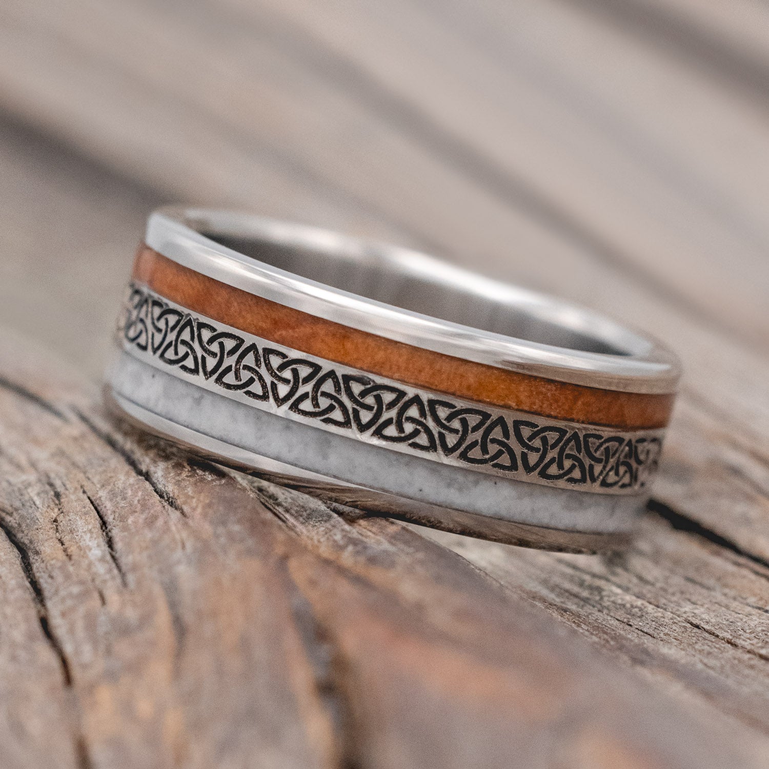 "Ryder" - engraved Celtic Triquetra knot men's wedding ring with granite & redwood inlays