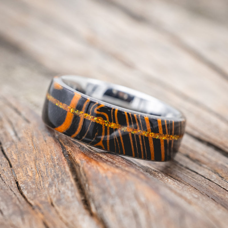 "REMMY" - ORANGE & BLACK WAVE WEDDING BAND WITH AN ORANGE OPAL INLAY