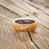 "REMMY" - WHISKEY BARREL OAK & GUITAR STRING INLAY WEDDING BAND