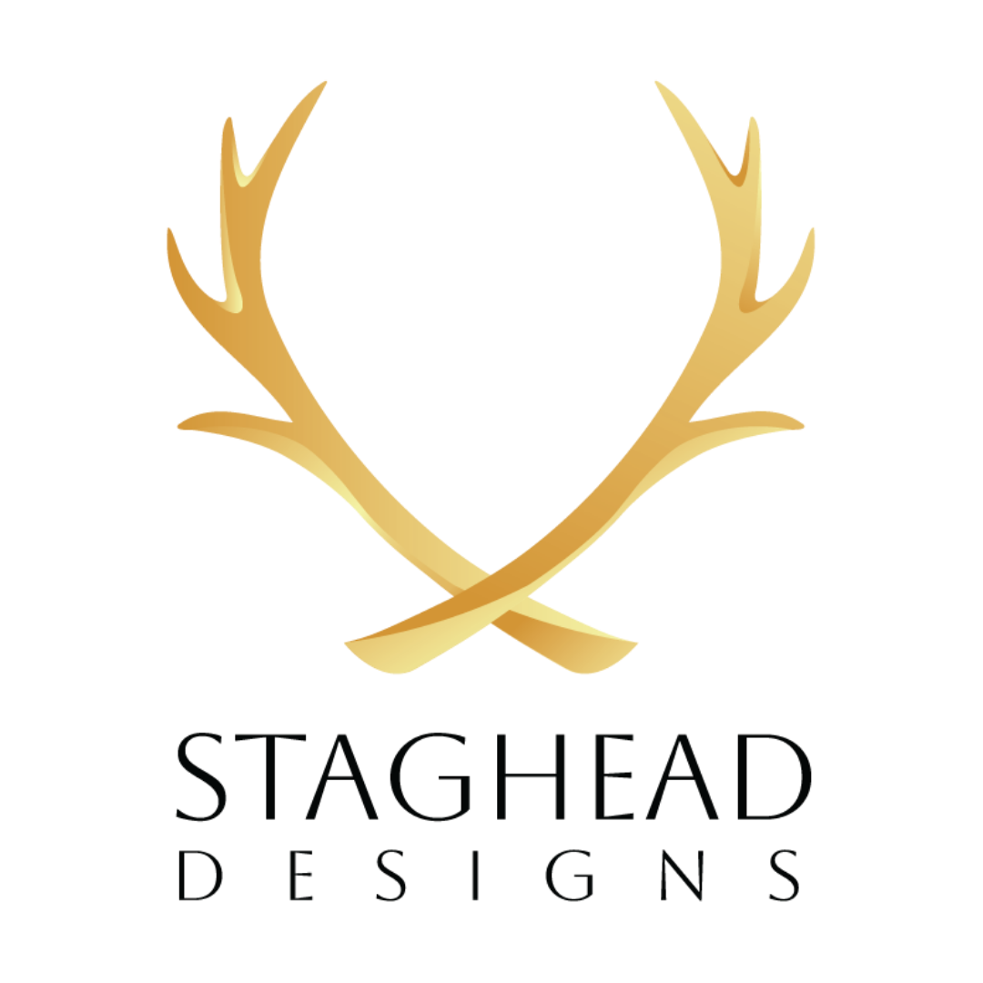 Transparent Staghead Designs logo with gold antlers
