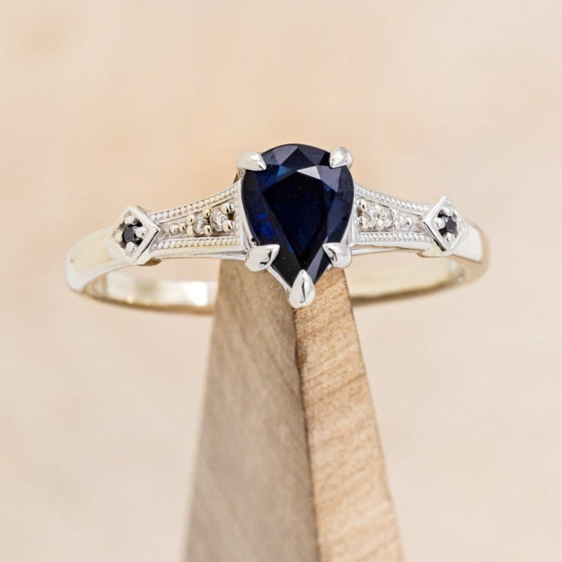 "ANNORA" - PEAR SHAPED LAB-GROWN BLUE SAPPHIRE ENGAGEMENT RING WITH BLACK & WHITE DIAMOND ACCENTS-1