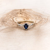 "ANNORA" - PEAR SHAPED LAB-GROWN BLUE SAPPHIRE ENGAGEMENT RING WITH BLACK & WHITE DIAMOND ACCENTS