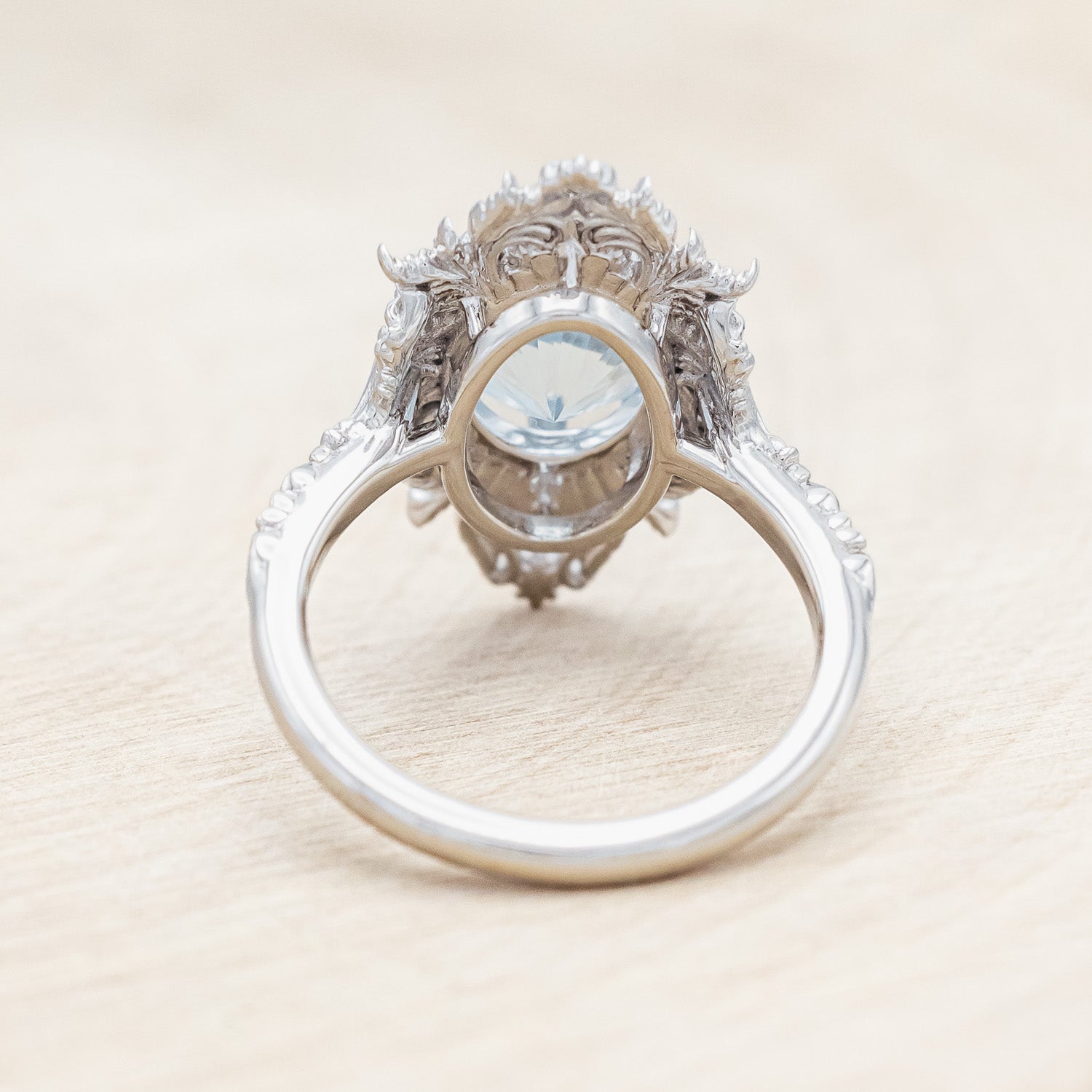 Back view of "Cherie" - sculptural-style aquamarine women's engagement ring with diamond accents