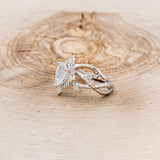 "ARTEMIS ON THE VINE DIVINE" - PEAR ENGAGEMENT RING WITH DIAMOND ACCENTS & A BRANCH-STYLE BAND-6