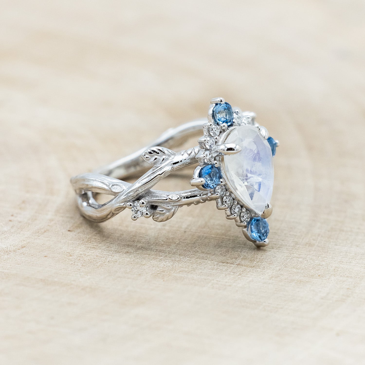 "ARTEMIS ON THE VINE DIVINE" - PEAR CUT MOONSTONE ENGAGEMENT RING WITH DIAMOND & AQUAMARINE ACCENTS IN A BRANCH-STYLE BAND-Staghead Designs