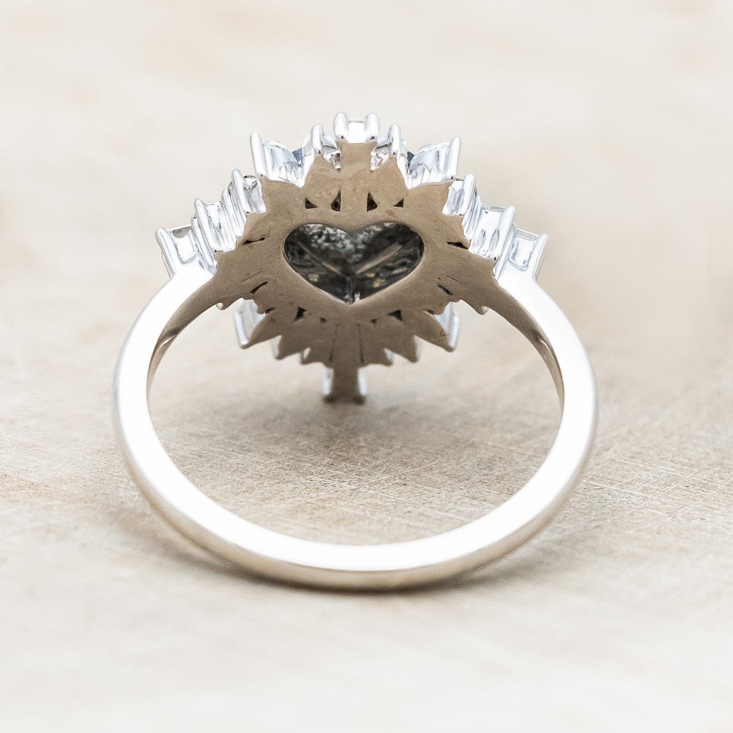 Back view of "Autumn" - women's engagement ring with heart cut salt & pepper diamond and diamond halo in 14K white gold