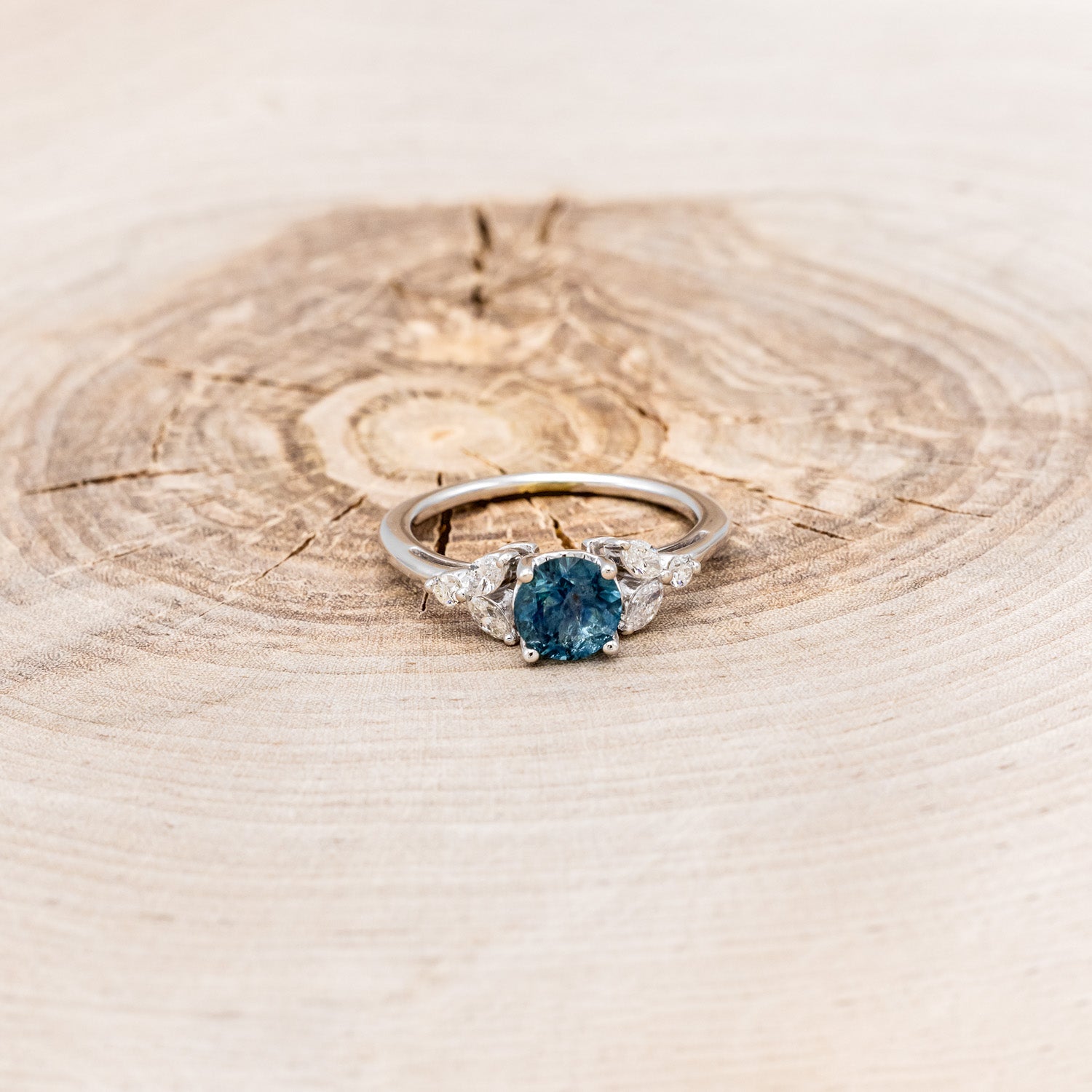 "BLOSSOM" - ROUND CUT MONTANA SAPPHIRE ENGAGEMENT RING WITH LEAF-SHAPED DIAMOND ACCENTS-10
