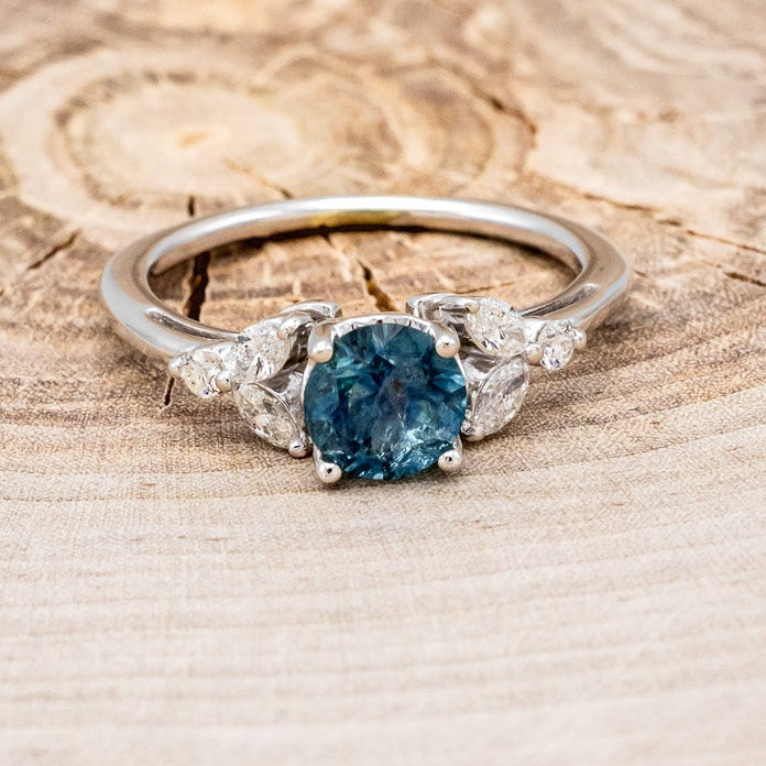"BLOSSOM" - ROUND CUT MONTANA SAPPHIRE ENGAGEMENT RING WITH LEAF-SHAPED DIAMOND ACCENTS-10