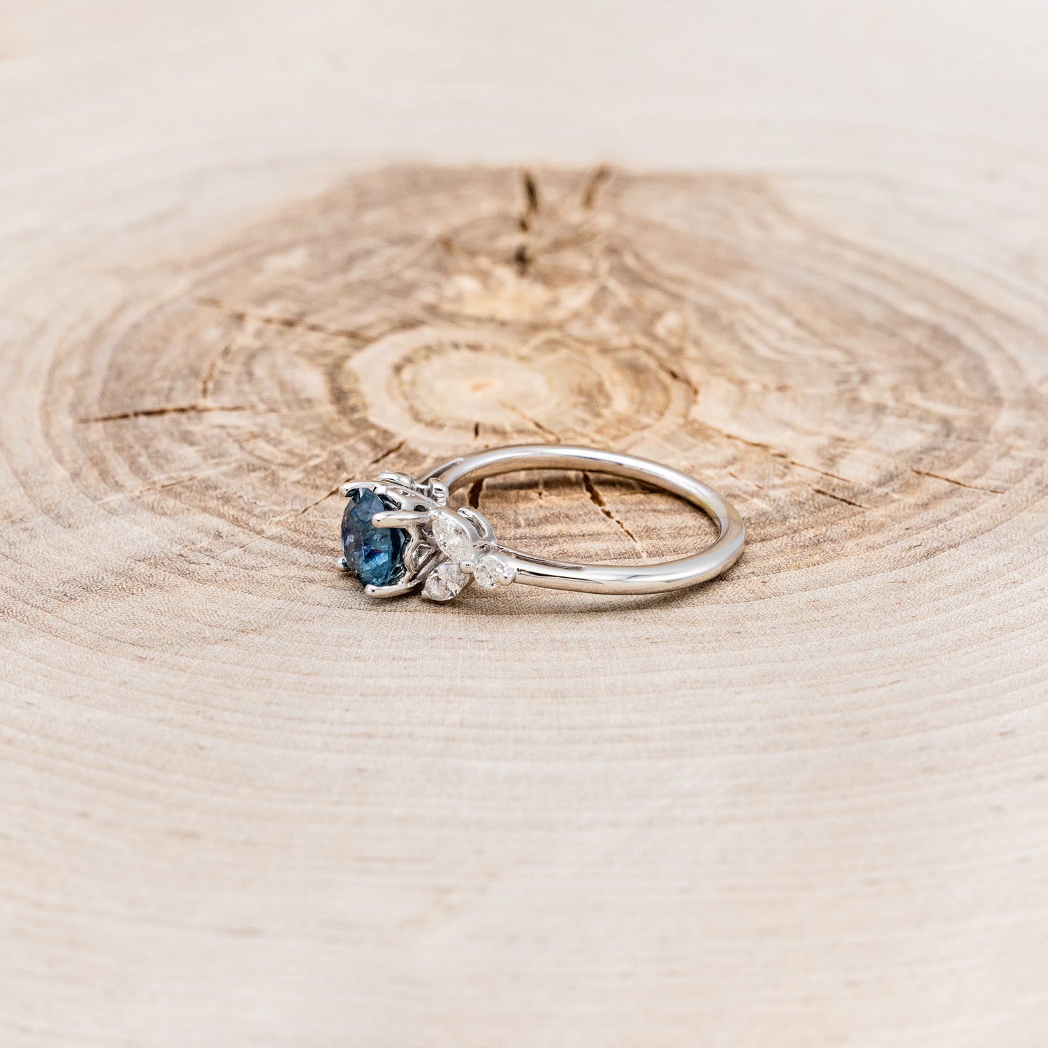 "BLOSSOM" - ROUND CUT MONTANA SAPPHIRE ENGAGEMENT RING WITH LEAF-SHAPED DIAMOND ACCENTS-9