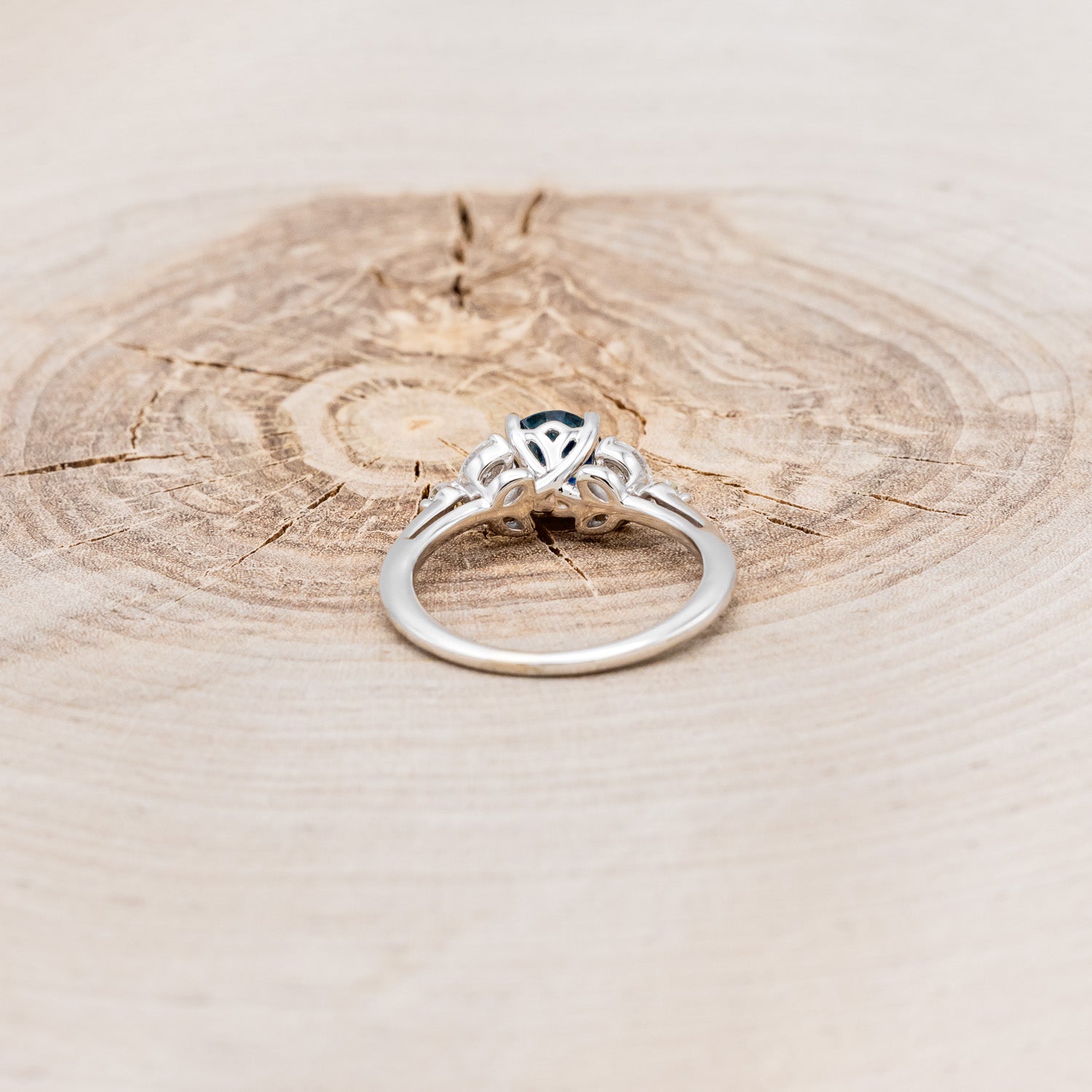 "BLOSSOM" - ROUND CUT MONTANA SAPPHIRE ENGAGEMENT RING WITH LEAF-SHAPED DIAMOND ACCENTS-11