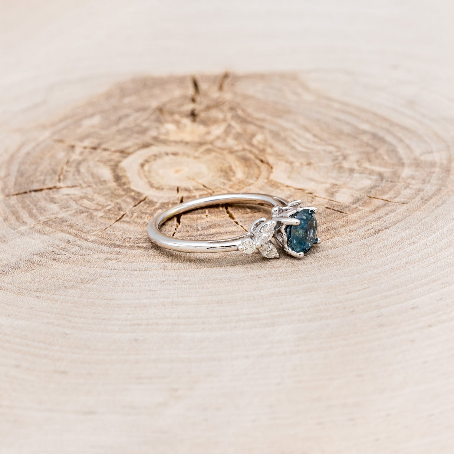 "BLOSSOM" - ROUND CUT MONTANA SAPPHIRE ENGAGEMENT RING WITH LEAF-SHAPED DIAMOND ACCENTS-8