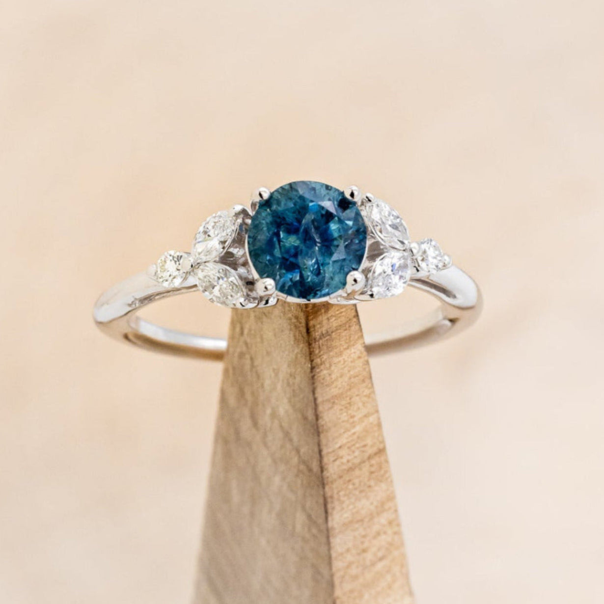 "BLOSSOM" - ROUND CUT MONTANA SAPPHIRE ENGAGEMENT RING WITH LEAF-SHAPED DIAMOND ACCENTS-7