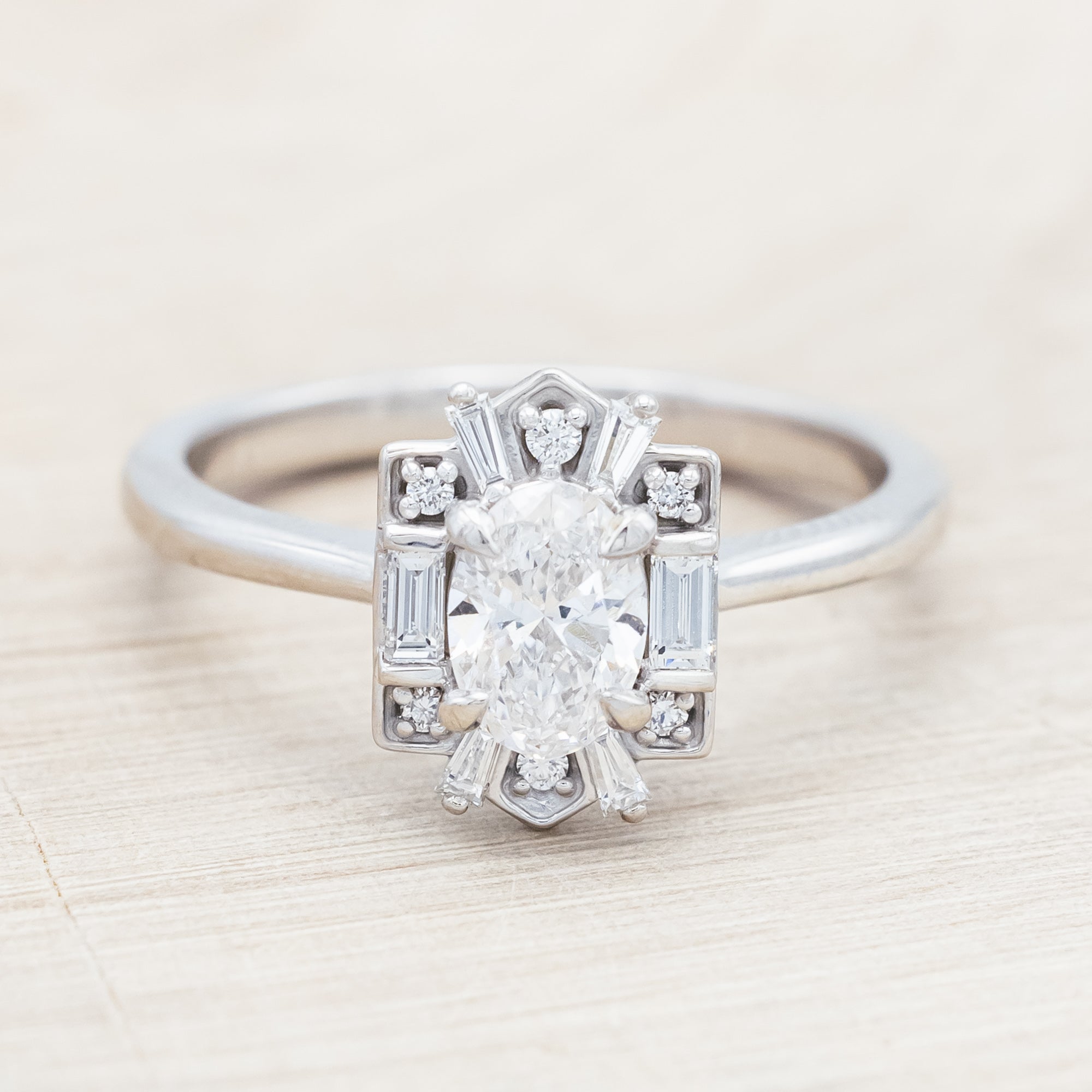 Lab diamond ring with genuine diamond accents against beige background