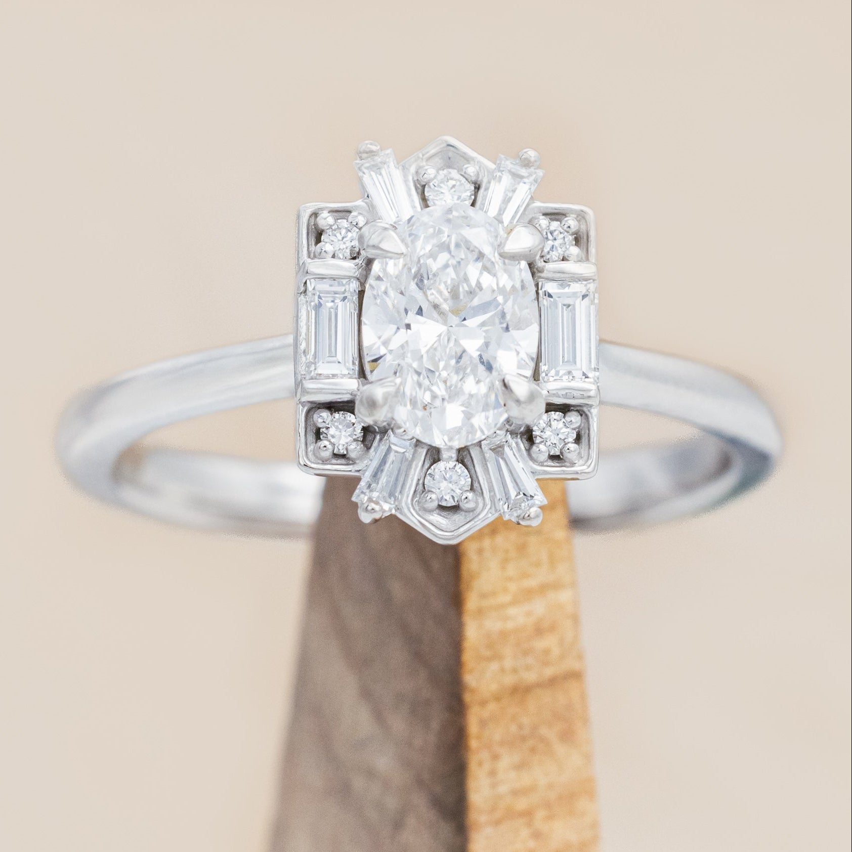 Lab diamond ring with genuine diamond accents against beige background