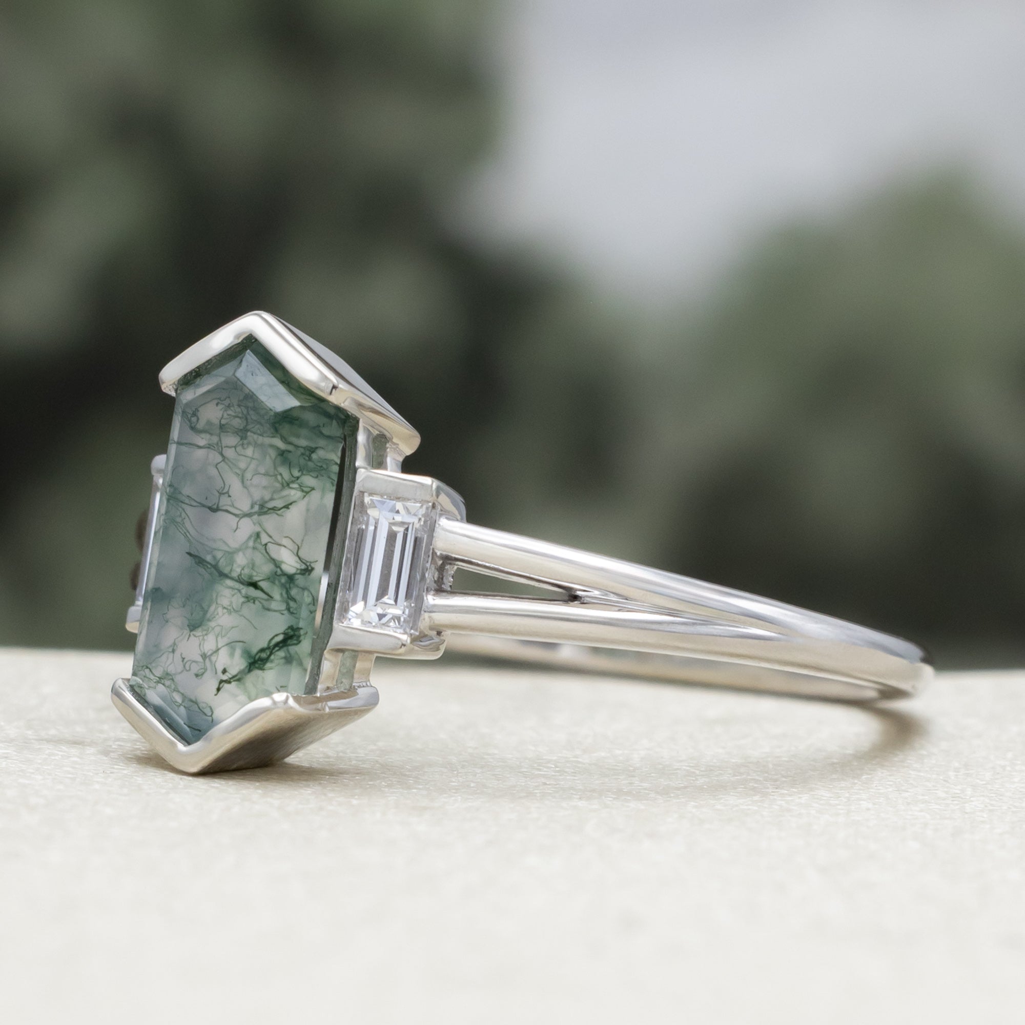 "Corella" - Half Bezel Set Elongated Hexagon Cut Moss Agate Engagement Ring With Diamond Accents