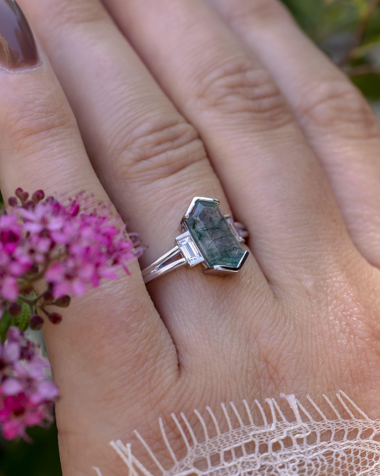 "Corella" - Half Bezel Set Elongated Hexagon Cut Moss Agate Engagement Ring With Diamond Accents