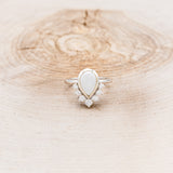 "ESMERALDA" - PEAR-CUT OPAL WEDDING BAND WITH DIAMOND ACCENTS & TRACER-10