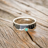 "HELIOS" - JET STONE & GOLD MOUNTAIN RANGE WEDDING RING FEATURING AN EMERALD ACCENT