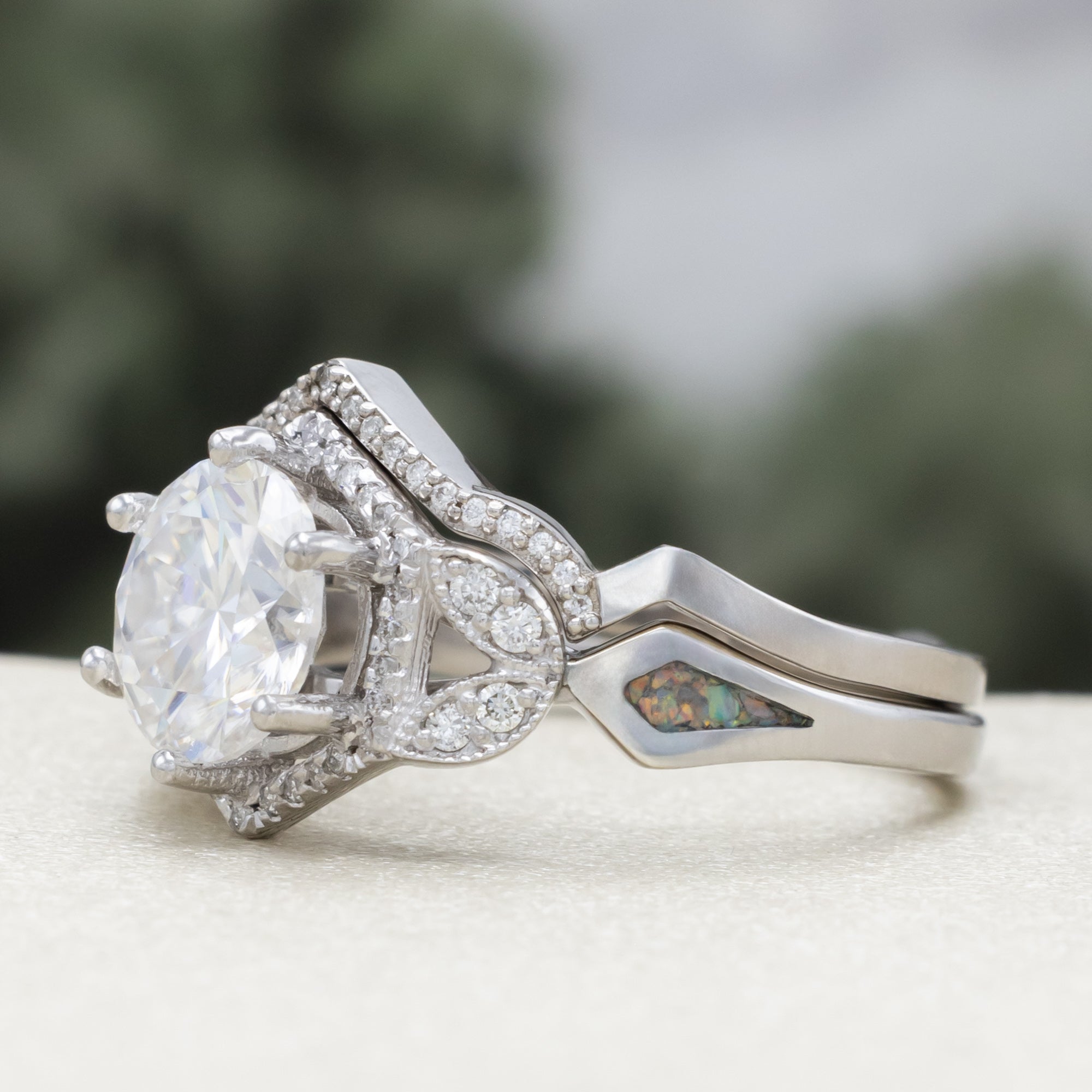 "Lucy In The Sky" - Round Cut Moissanite Engagement Ring With Diamond Accents & Fire And Ice Opal Inlays