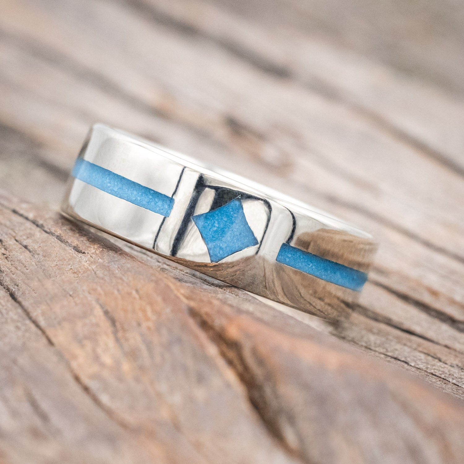 "Maddox" men's wedding ring featuring centered custom channel and diamond-shaped turquoise inlays