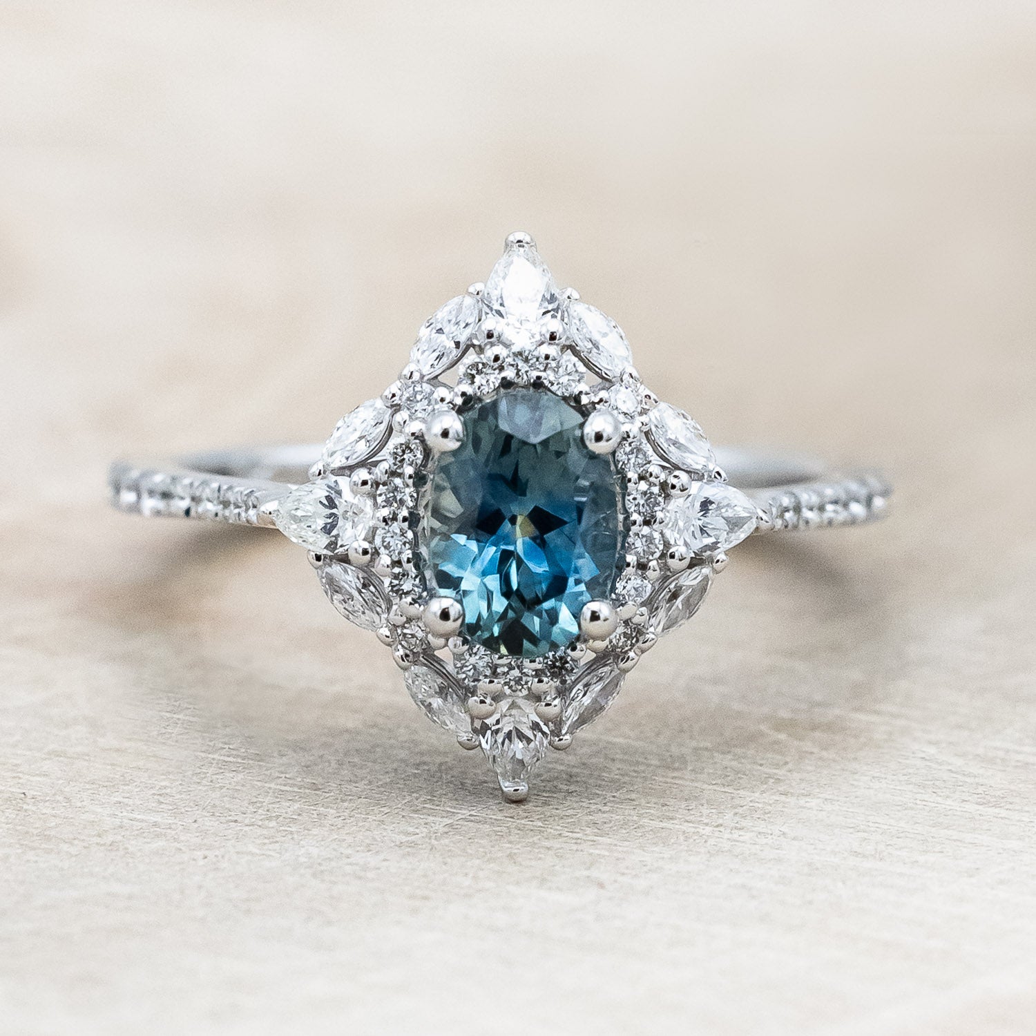 "NORTH STAR" - OVAL CUT MONTANA SAPPHIRE ENGAGEMENT RING WITH DIAMOND HALO & ACCENTS-Staghead Designs
