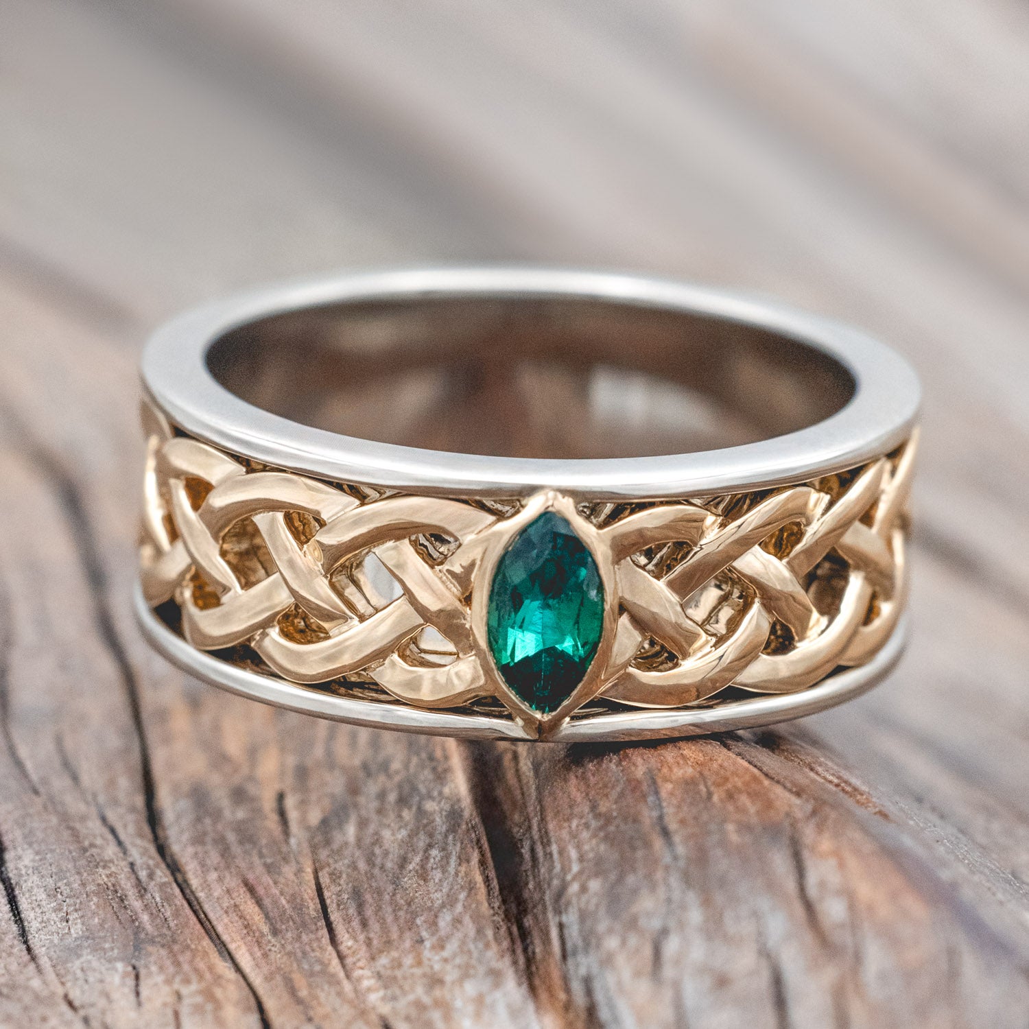 "Oberon" - two-toned men's wedding ring with Celtic knot filigree and lab-grown emerald accent