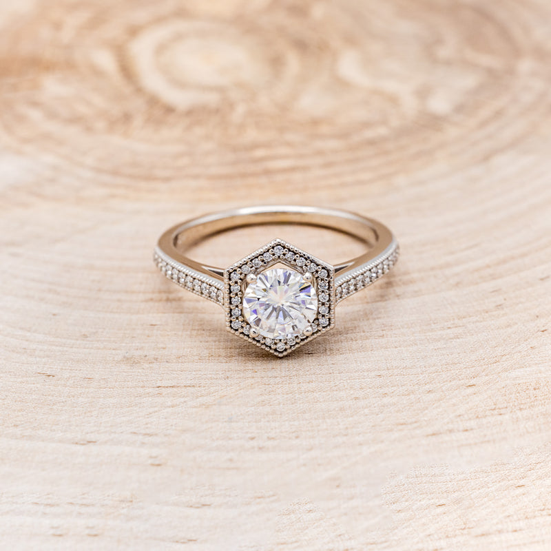 "ODESSA" - ROUND CUT MOISSANITE ENGAGEMENT RING WITH DIAMOND HALO & ACCENTS