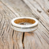 "RAPTOR" - ELK ANTLER & PYRITE WEDDING BAND WITH A WHISKEY BARREL OAK LINING