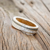 "RAPTOR" - ELK ANTLER & PYRITE WEDDING BAND WITH A WHISKEY BARREL OAK LINING